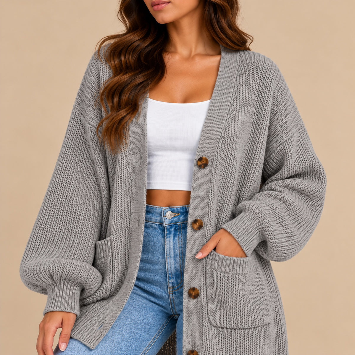 Women's oversized textured knit cardigan in grey – three-quarter front view