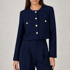 Women's cropped jacket with gold buttons and pocket detail in navy blue – front view