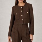 Women's cropped jacket with gold buttons and pocket detail in brown – front view