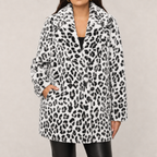 Women's faux fur leopard print coat with long lapel collar in white leopard – front view