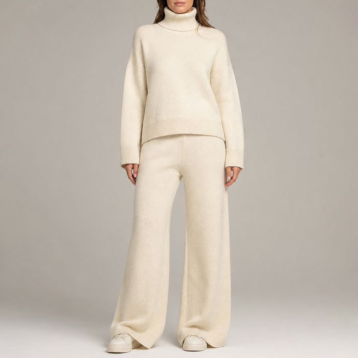 Women's knit co-ord set with roll-neck jumper and wide-leg trousers in cream – front view