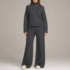 Women's knit co-ord set with roll-neck jumper and wide-leg trousers in dark grey – front view